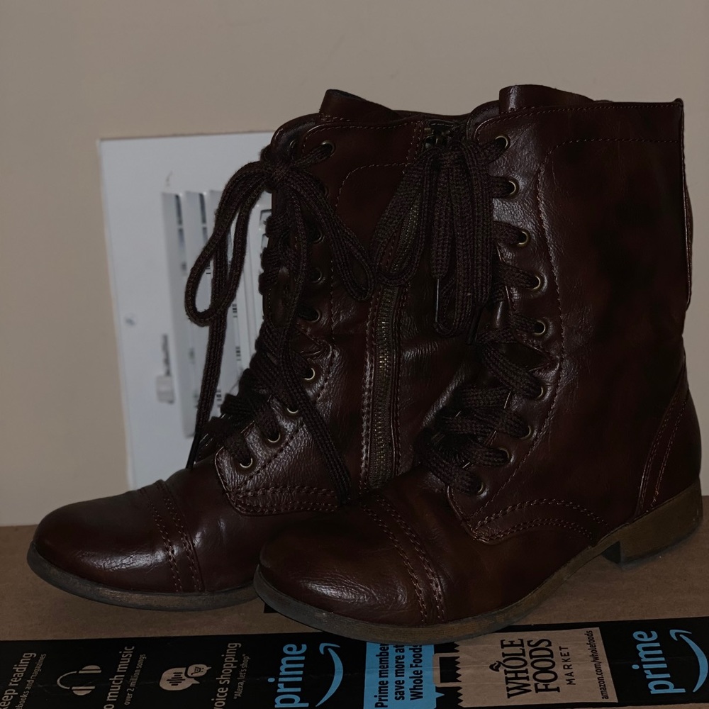 Brown tie-up combat boots